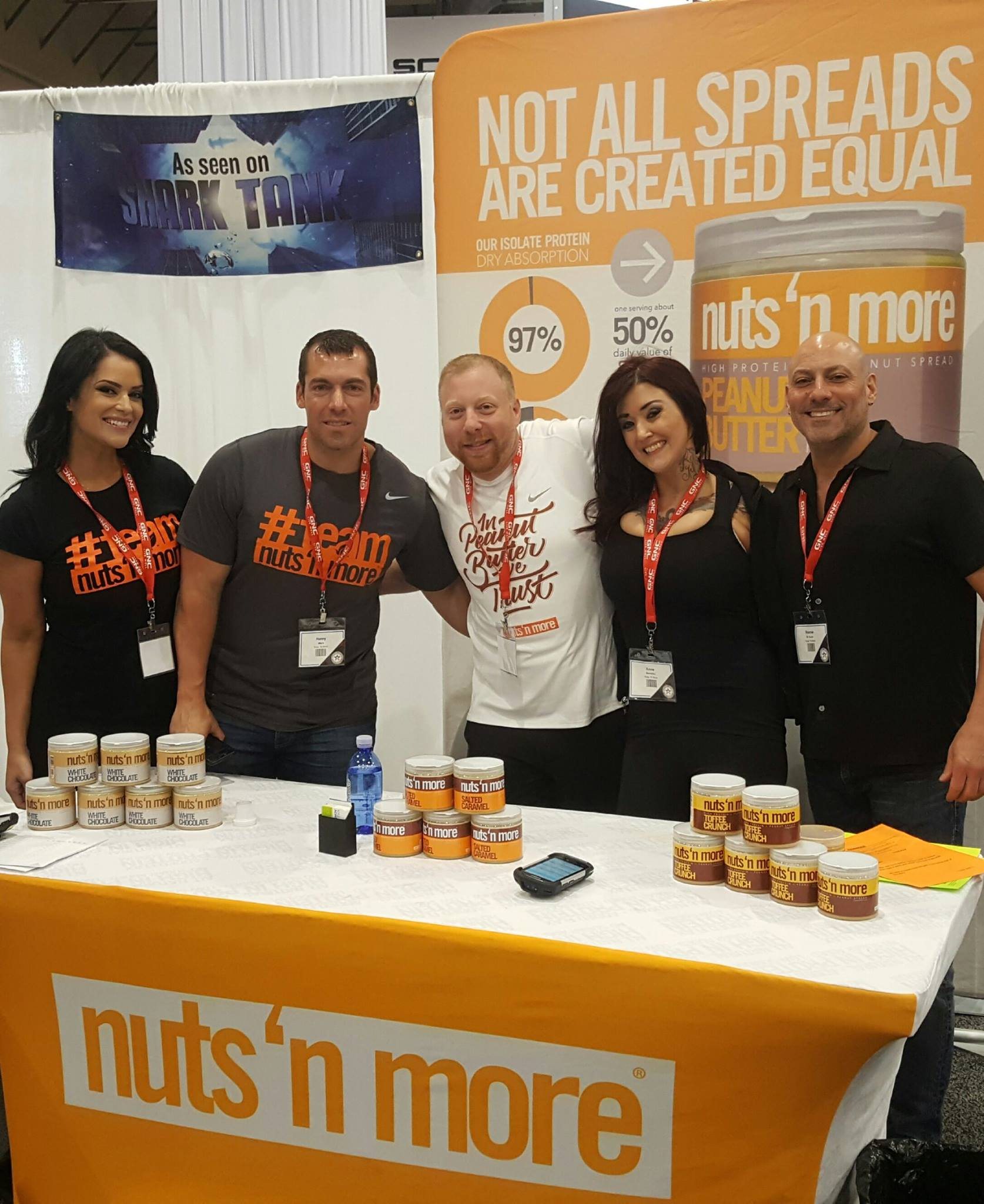 Nuts ’N More GNC expo booth with promotional banner